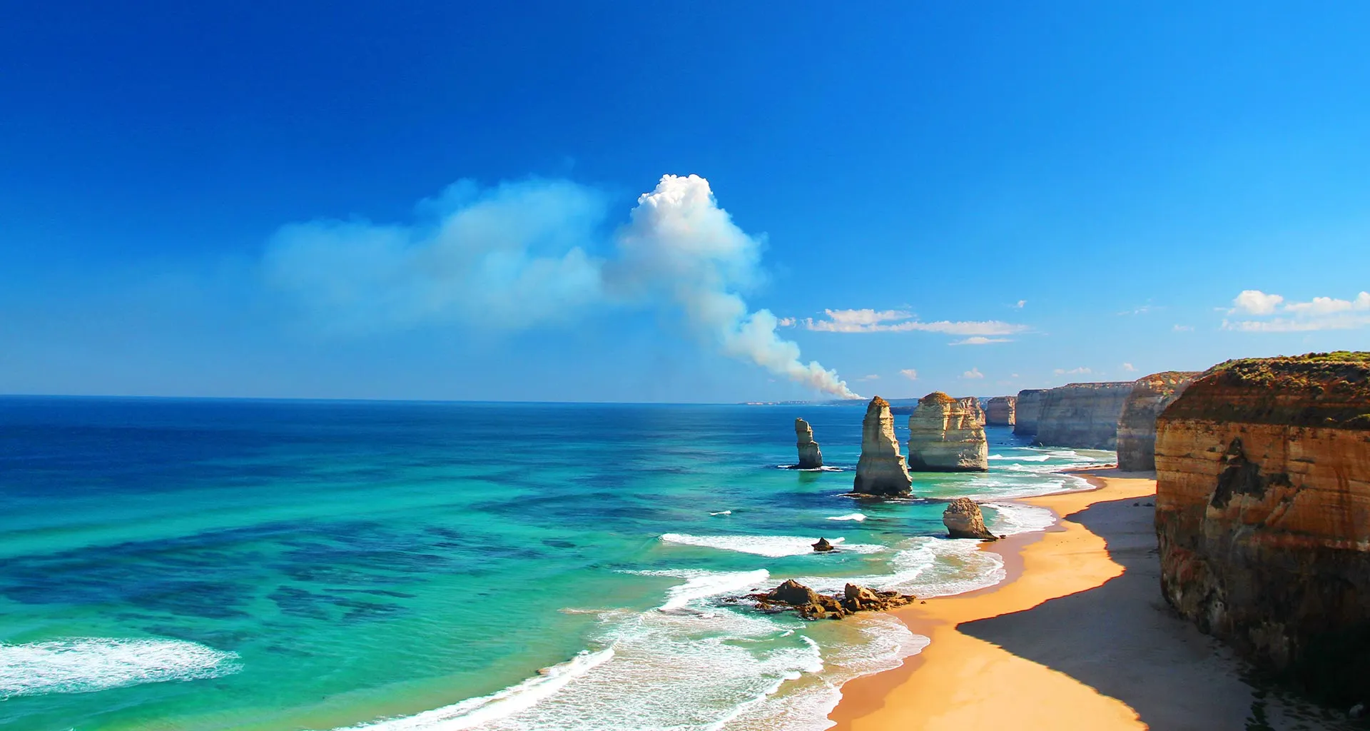 Great Ocean Road coastal drive along Victoria's Southern Ocean — limestone cliffs, turquoise water and winding scenic road