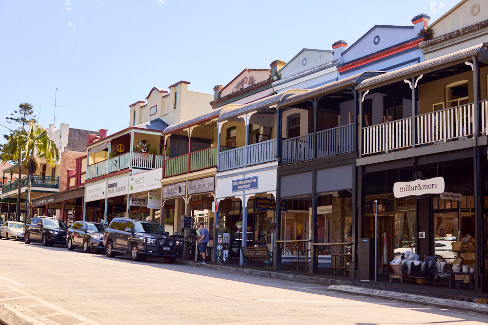 Heritage shopfronts with verandahs along Bangalow's main street in the Byron hinterland
