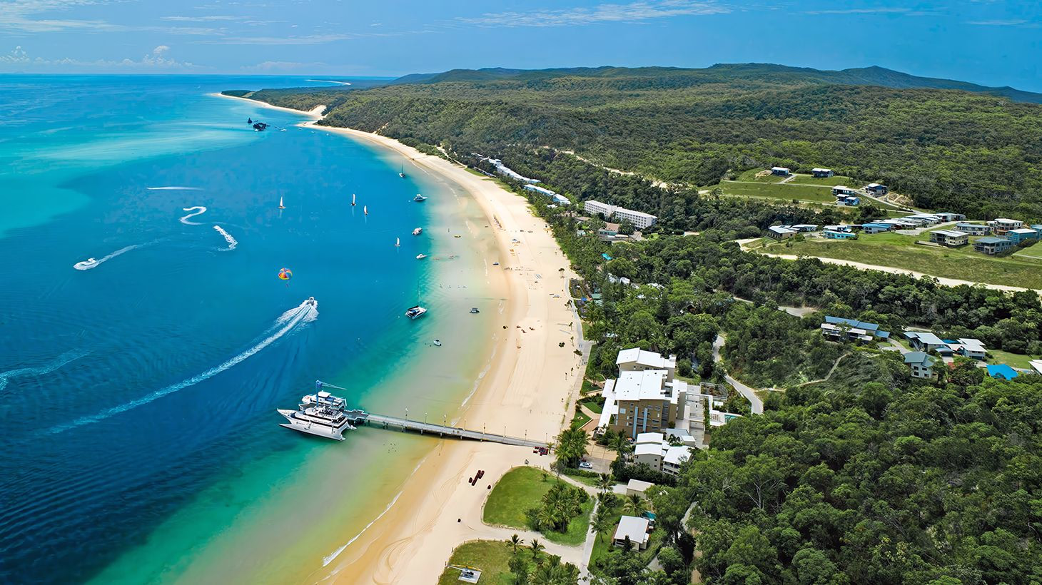 Moreton Bay island beach and clear water, seated island cruise day trip for seniors from Brisbane