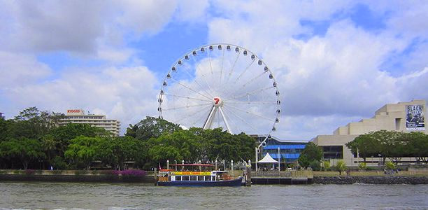 The Wheel of Brisbane at South Bank Parklands, a seated attraction on a flat sealed precinct