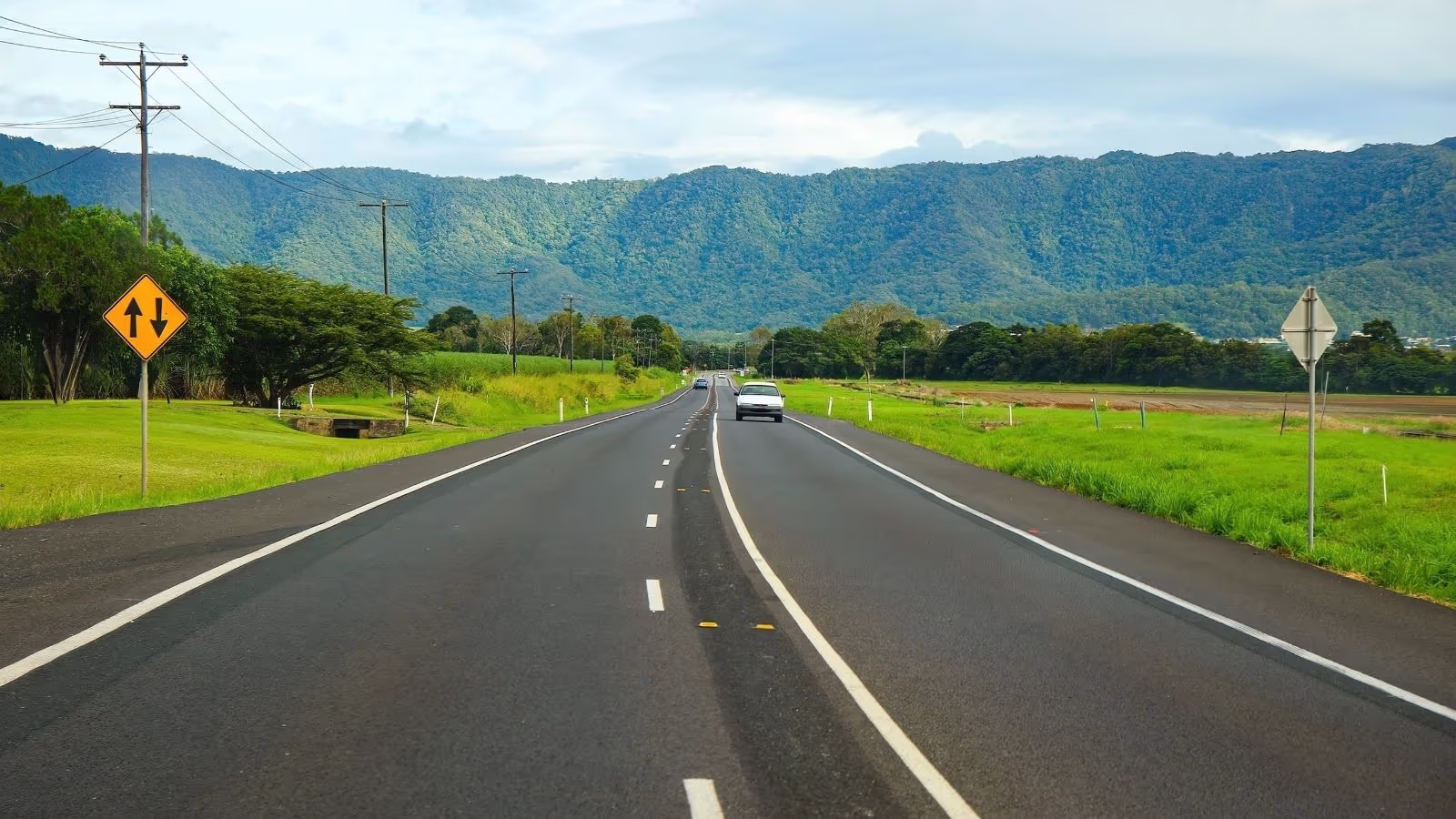 The Bruce Highway running beside the Queensland coast on the drive north from Brisbane to Cairns