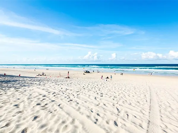 Clean morning conditions on a Gold Coast beach with turquoise water and golden sand