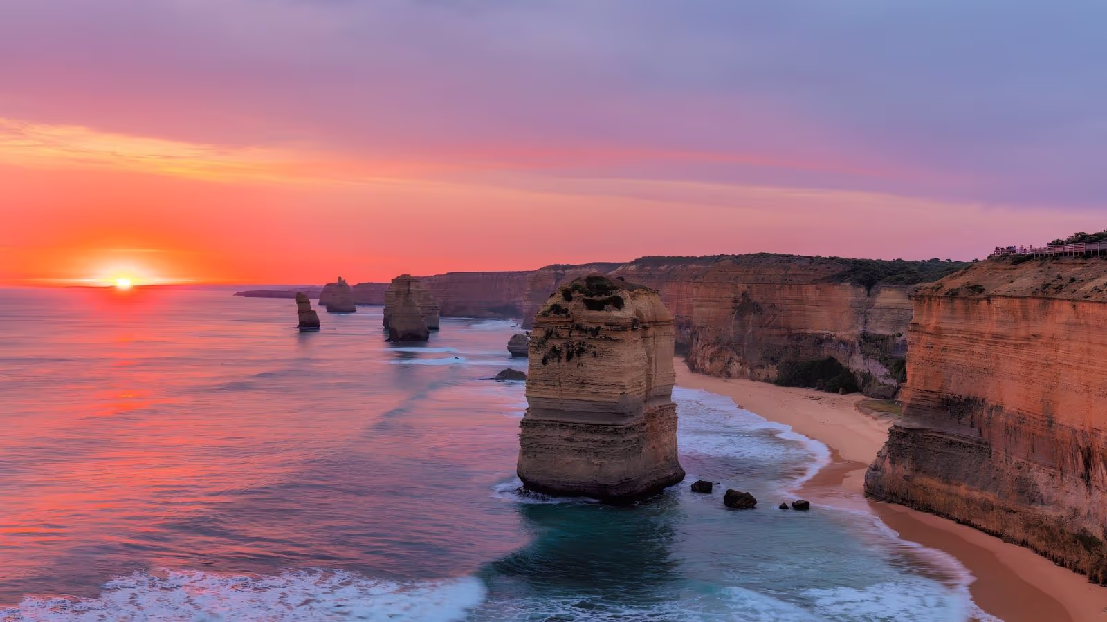 Great Ocean Road Twelve Apostles limestone stacks golden sunset Victoria — Highway 1 Big Lap most scenic Australian coastal drive Melbourne to Adelaide