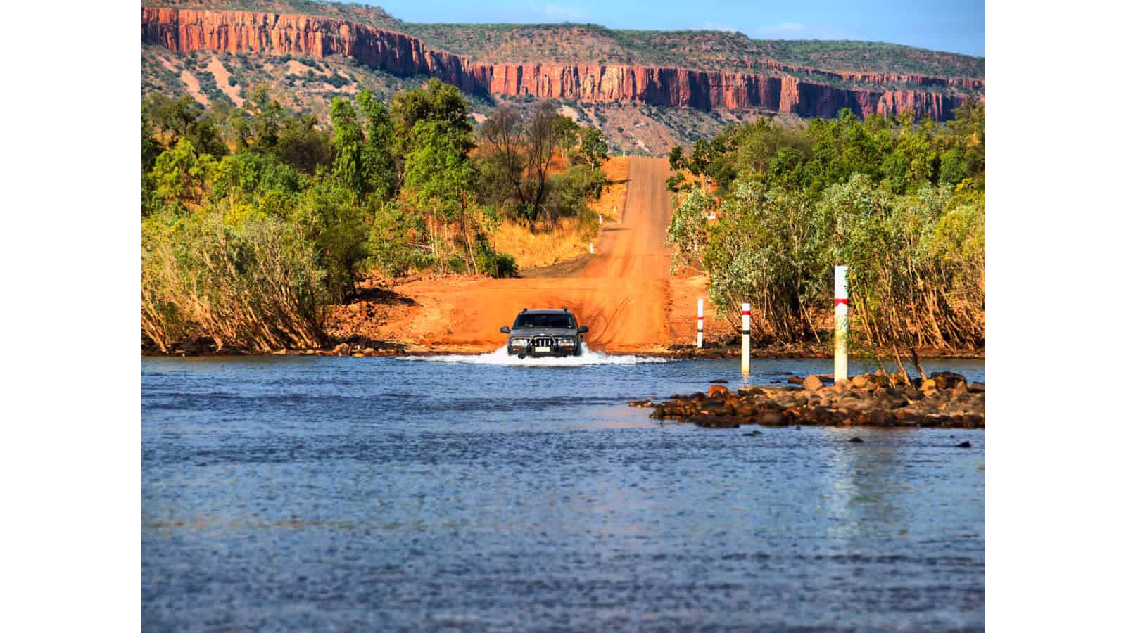 Gibb River Road ancient red rock gorge Kimberley Western Australia 4WD river crossing — Big Lap detour Derby to Kununurra